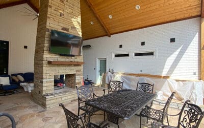 Electrical project in covered outdoor area with ceiling fan and tv